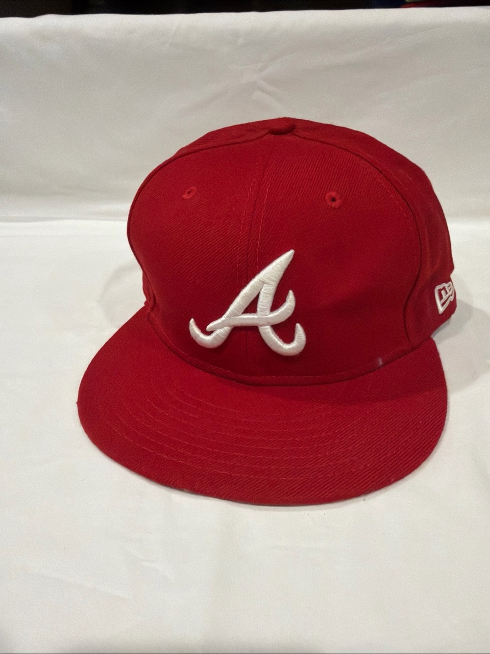 New Era Red Cap with White 'A' Embroidered Logo